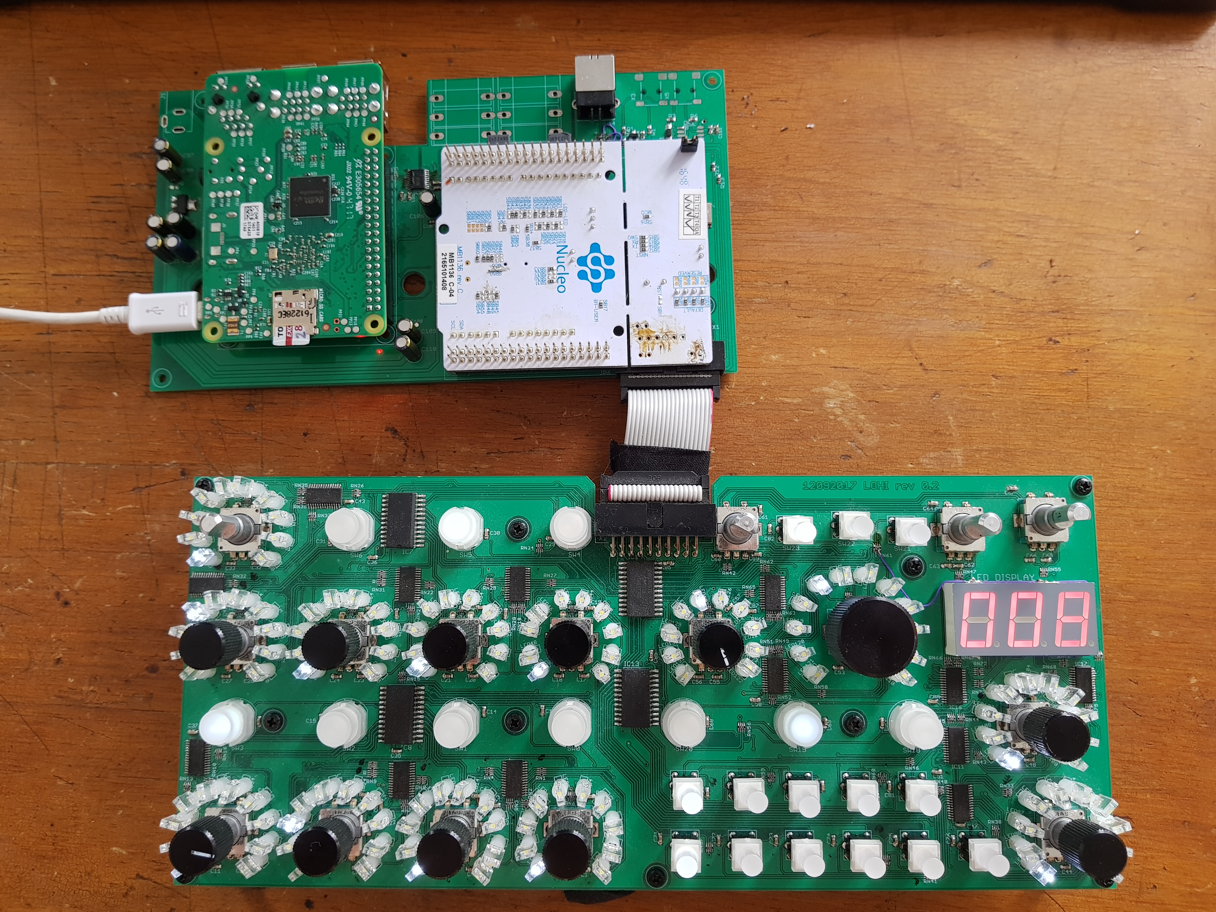 LOHI Bassline Junkie prototype — interface PCB connected to Nucleo board via ribbon cable