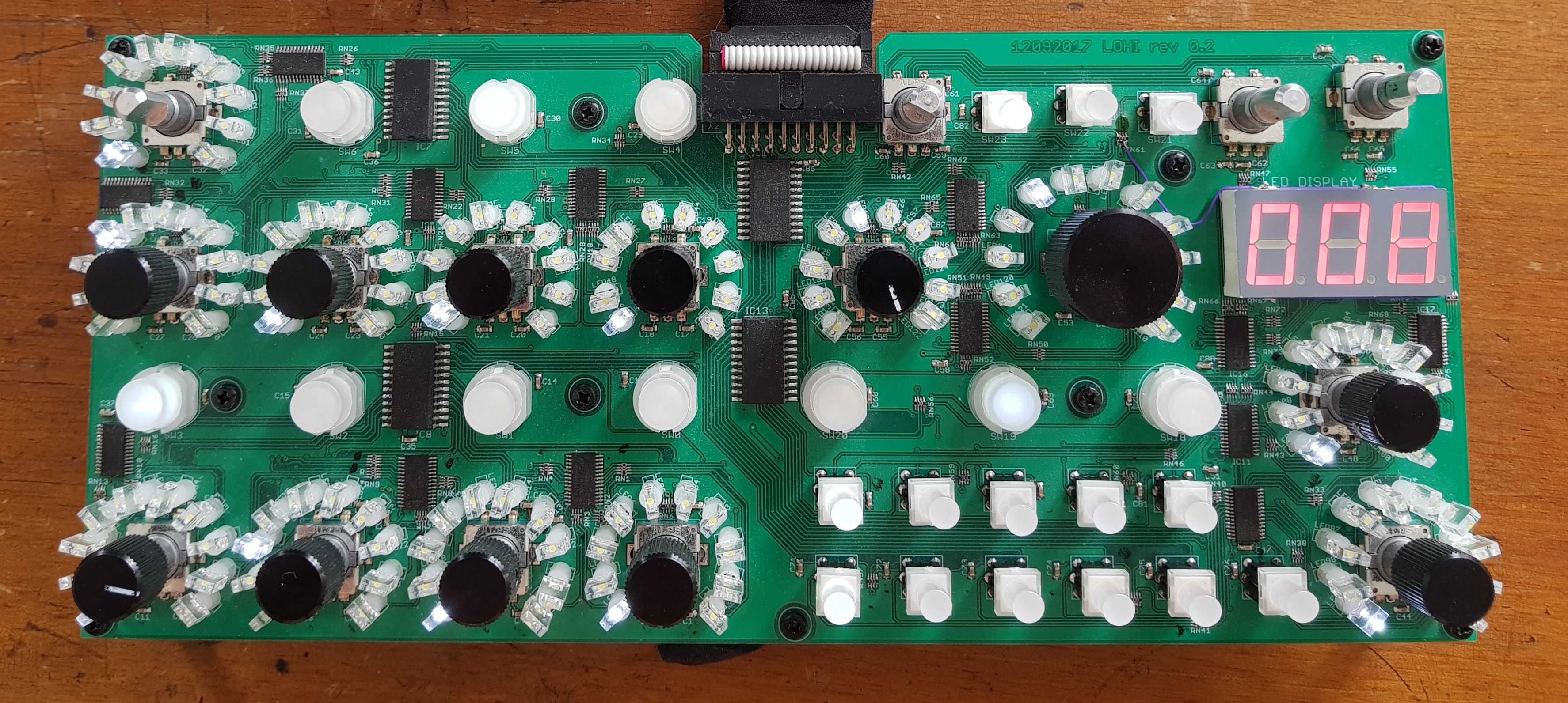 LOHI Bassline Junkie interface PCB close-up showing components and LED display
